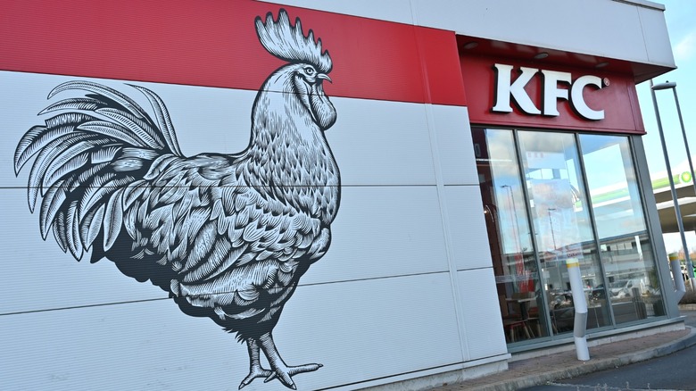 a giant chicken mural on a KFC wall
