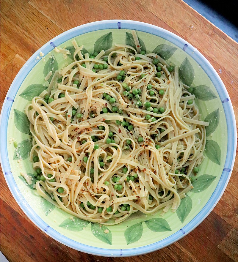 Back-to-school calls for easy dinners like fettucini tossed with peas and Parmesan, from Jacques Pepin's latest cookbook. / Gretchen McKay/The Pittsburgh Post-Gazette/TNS