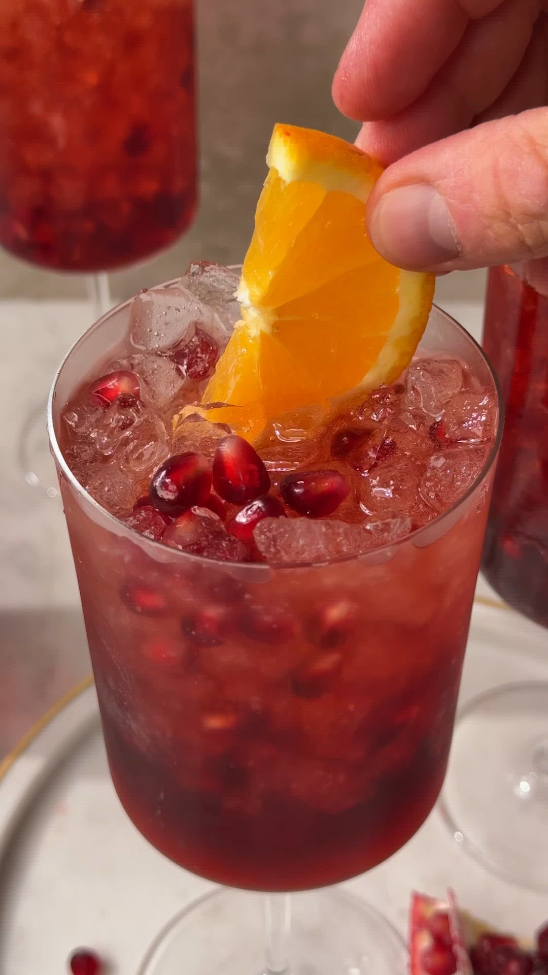 pomegranate spritz topped with champagne