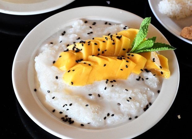Mango sticky rice at Lotus Moon, a Vietnamese plant-based restaurant in Boulder. (Cliff Grassmick/Staff Photographer)