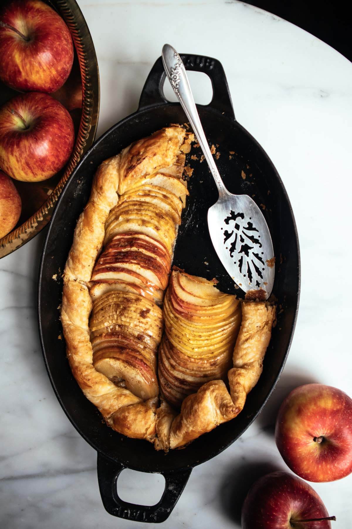 apple tart served in a large cast iron skillet