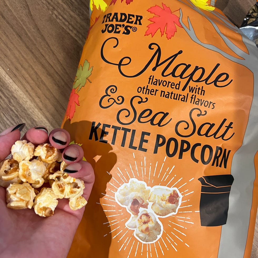 hand holding maple kettle corn popcorn