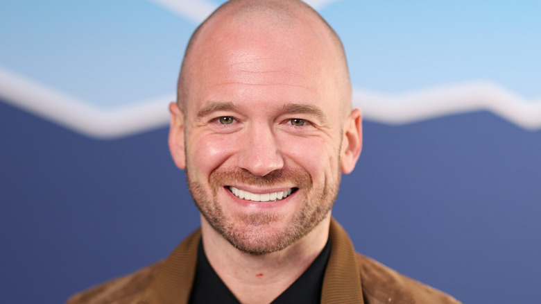 Close-up of Sean Evans smiling for a photo