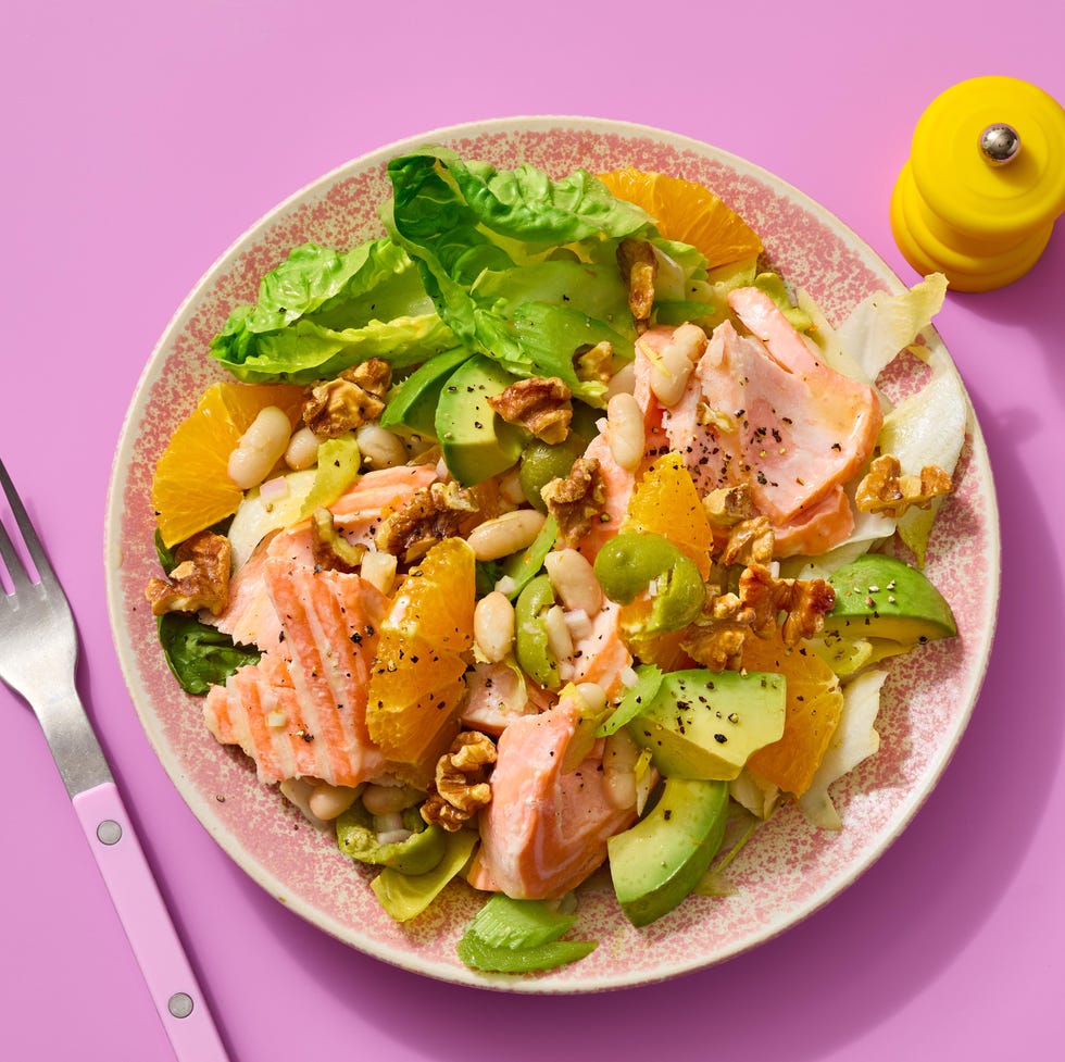 salmon, avocado, and citrus salad. dinnertime meals.