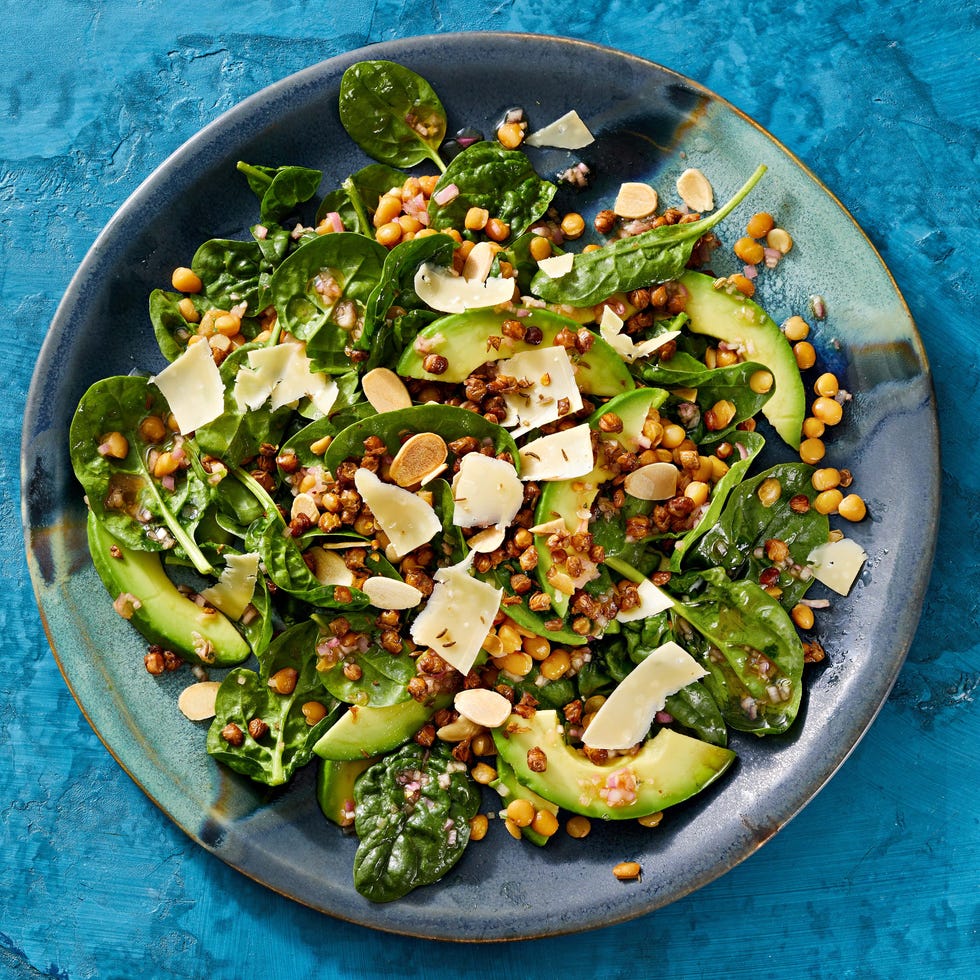 spinach salad with crispy lentils and aged gouda