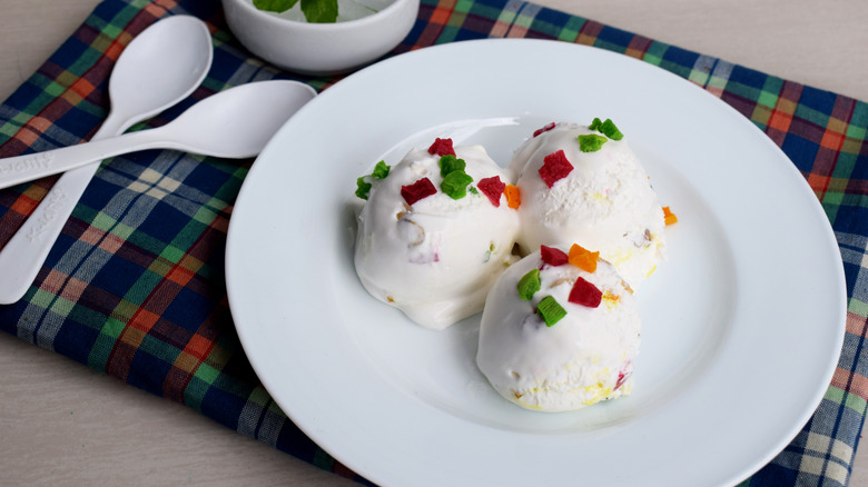Three scoops of tutti frutti ice cream in a bowl