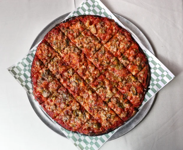 The sausage and giardiniera pizza at Pizz'amici, 1215 Grand Ave. in Chicago, Sept. 25, 2025. (Chris Sweda/Chicago Tribune)