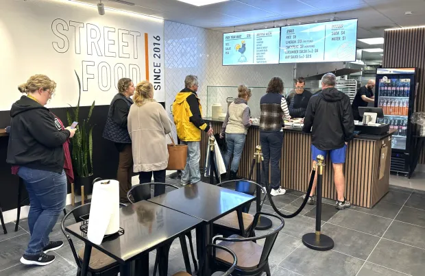 Long lines are the norm at Chicken Over Rice Co., simple menu choices keep things moving quickly. (Courtesy of Chicken Over Rice Co.)